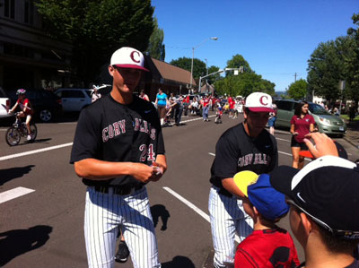 Knights' players walk in the Corvallis July 4th parade